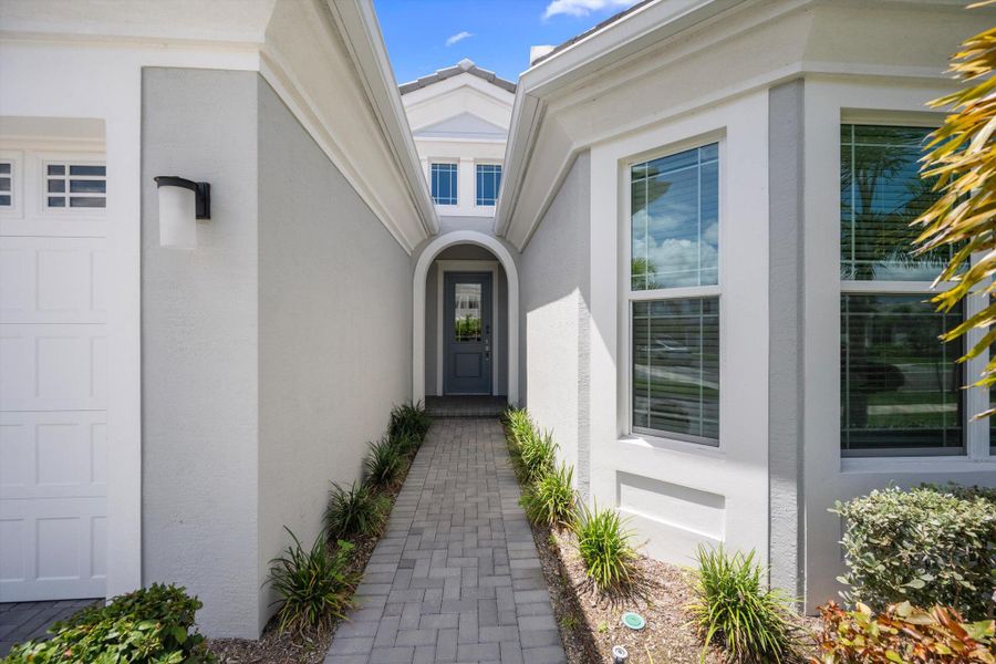 Front exterior of a new home in , Westlake, FL, highlighting curb appeal (Image 32).