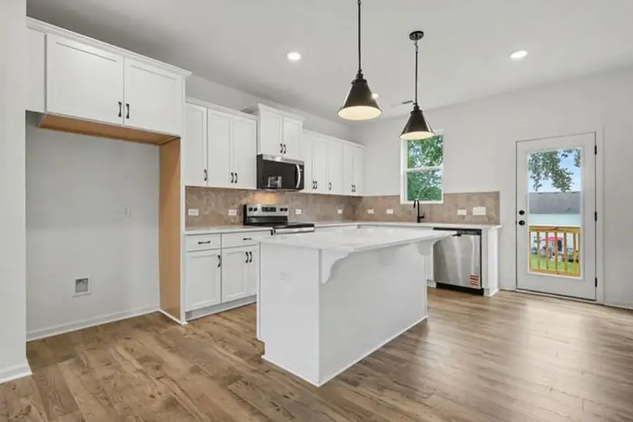 Representative furnished interior of a home built from the Darlow TH by True Homes in Penley Place Townhomes, Clover (Image 4). Representative furnished interior of a home built from the Darlow TH by True Homes in Penley Place Townhomes, Clover (Image 4).