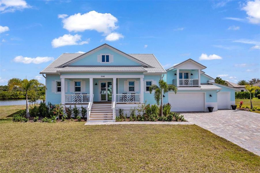 Front exterior of a new home in , Punta Gorda, FL, highlighting curb appeal (Image 2).