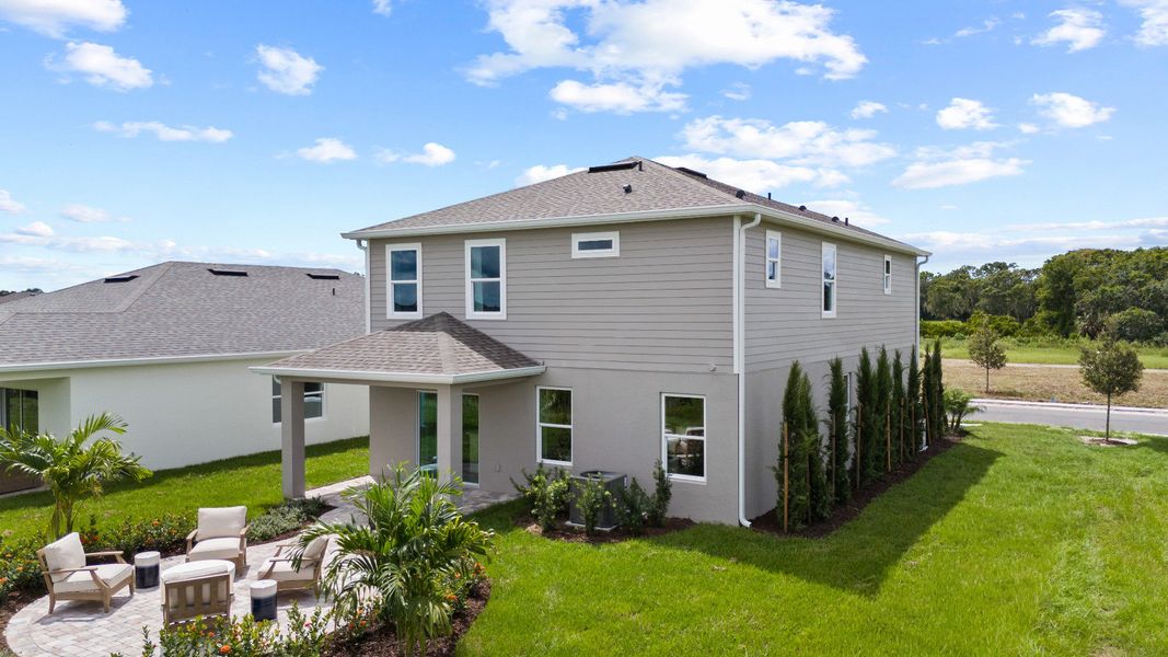 Representative exterior photo of a completed home built from the Ponte Verde by DRB Homes in Willowbrook North, Winter Haven, FL (Image 33). Representative exterior photo of a completed home built from the Ponte Verde by DRB Homes in Willowbrook North, Winter Haven, FL (Image 33).