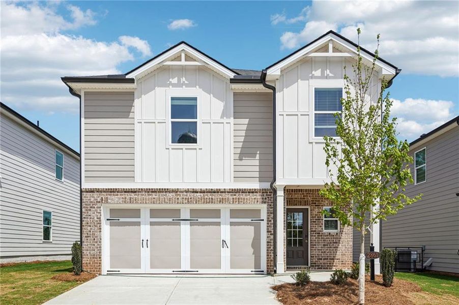 Front exterior of a new home in Hawthorne Station, College Park, GA, highlighting curb appeal (Image 1). Front exterior of a new home in Hawthorne Station, College Park, GA, highlighting curb appeal (Image 1).