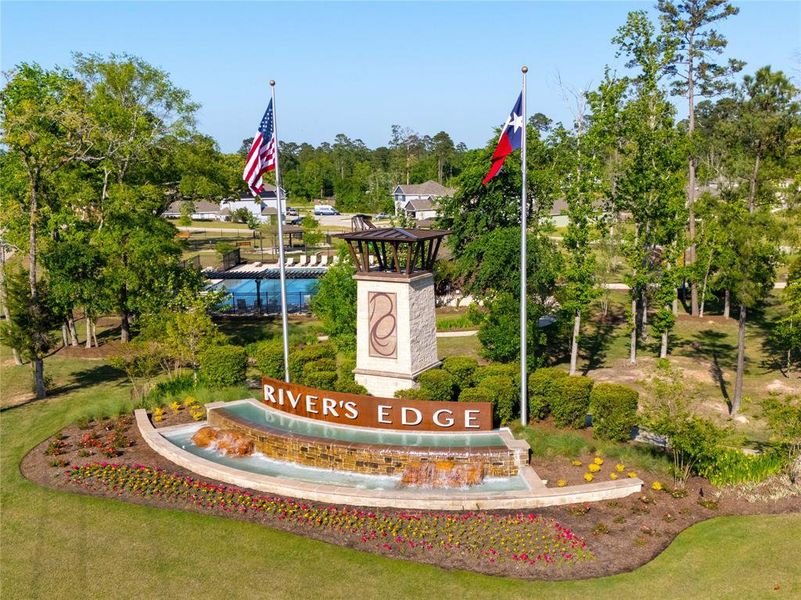 Community amenities including walking trails, playground, and resort-style pool. Experience the best of River's Edge living!