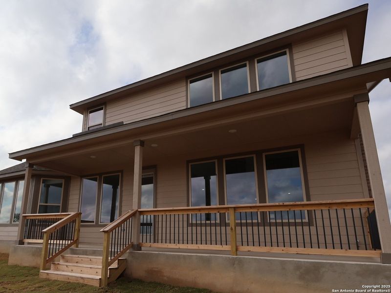 Exterior details and patio area of a home in Preserve at Annabelle Ranch, San Antonio (Image 3).