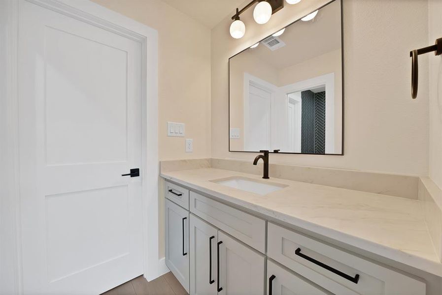Bathroom featuring vanity Bathroom featuring vanity