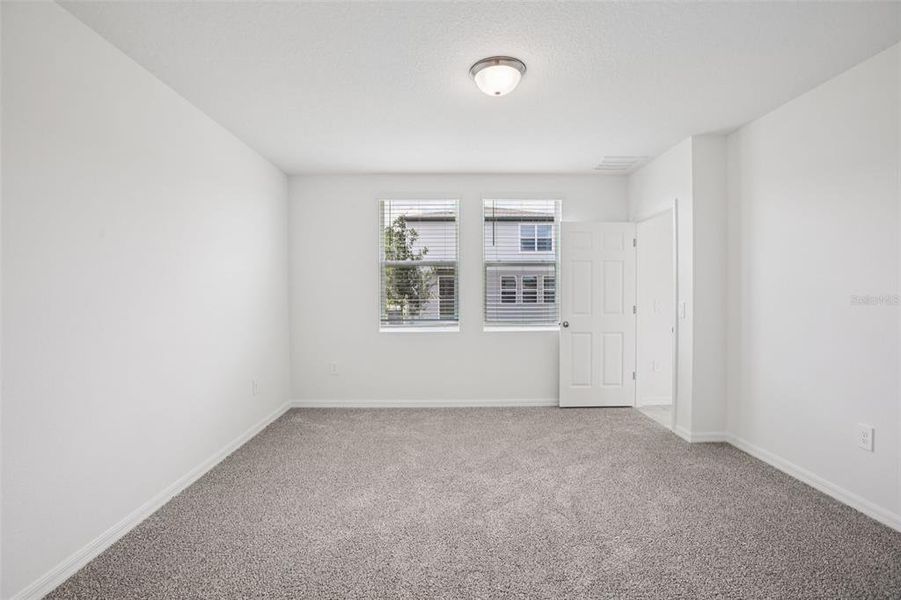 Spacious, unfurnished interior of a new home in Villamar - Classic Series, Winter Haven (Image 31).