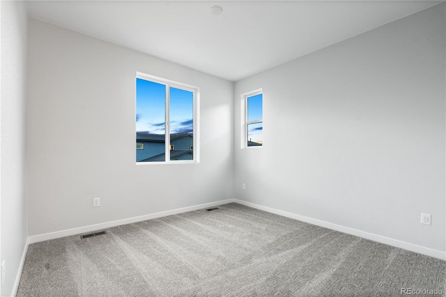 Spacious, unfurnished interior of a new home in Tribute at Lyric, Lone Tree (Image 22).