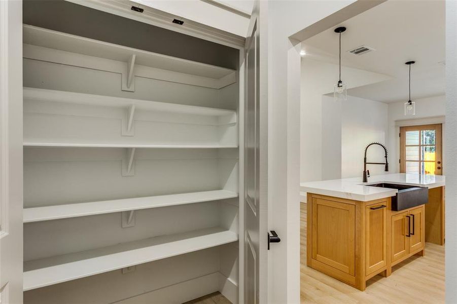 Storage area featuring a sink Storage area featuring a sink