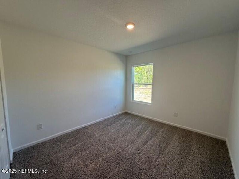 Spacious, unfurnished interior of a new home in Grand Reserve, Bunnell (Image 45).