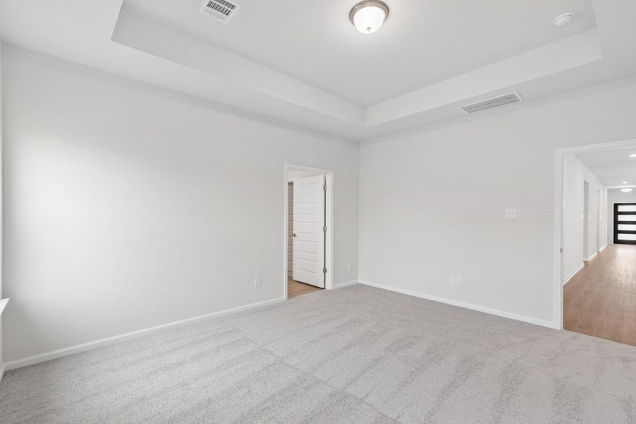 The Oakshire II- Primary Bedroom with Tray Ceiling.