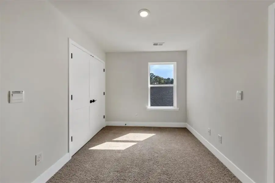Spacious, unfurnished interior of a new home in Canterbury Villas, Carrollton (Image 31).