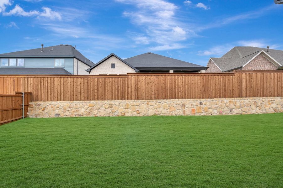Exterior details and patio area of a home in Terraces – Classics, Rockwall (Image 3). Exterior details and patio area of a home in Terraces – Classics, Rockwall (Image 3).