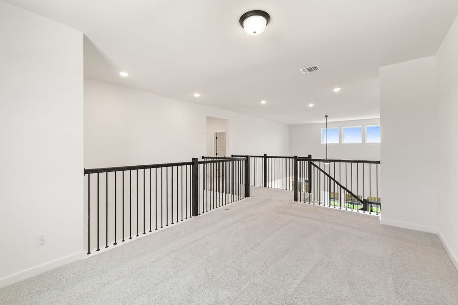 Spacious, unfurnished interior of a new home in Heritage, Dripping Springs (Image 45).