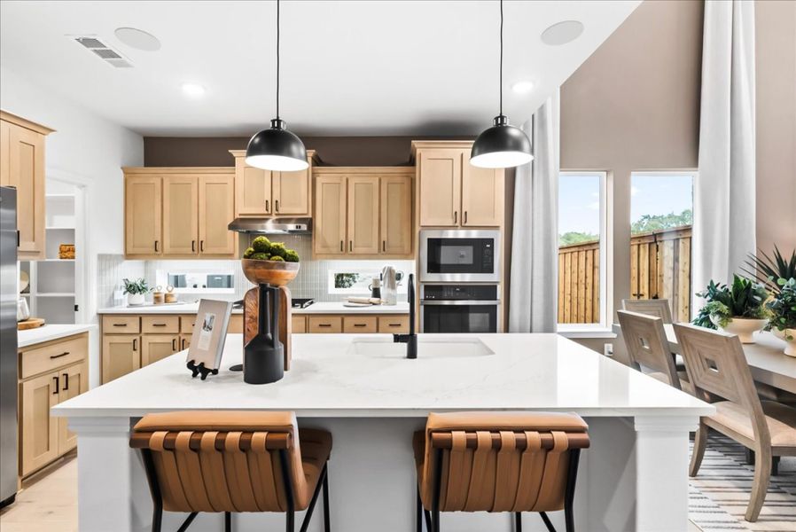 Furnished interior view inside a new home in The Reserve at Spiritas Ranch, Little Elm (Image 4).