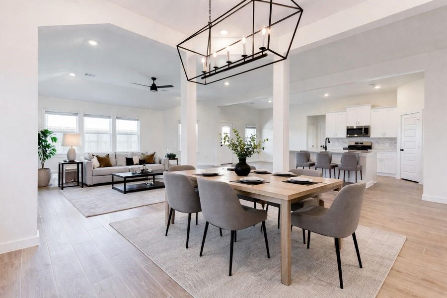 Elegant formal dining space with ample room for entertaining, located just off the kitchen and living area. This photo has been virtually staged for visual reference.