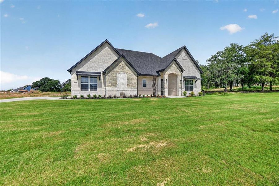 Front exterior of a new home in , Azle, TX, highlighting curb appeal (Image 24). Front exterior of a new home in , Azle, TX, highlighting curb appeal (Image 24).