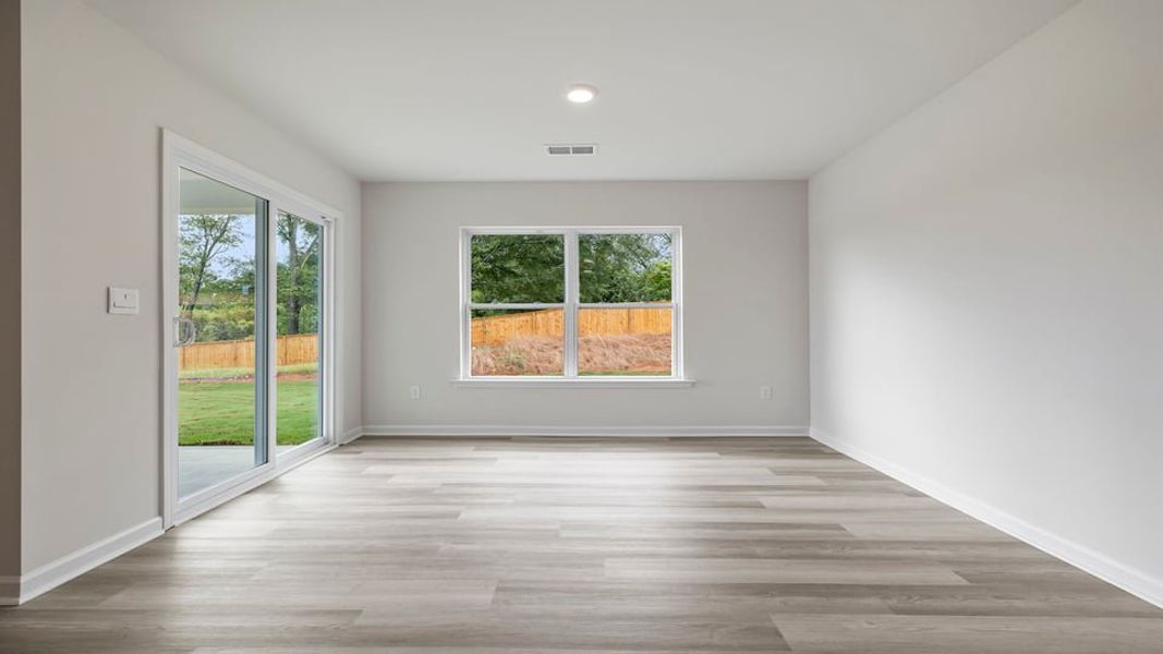 Spacious, unfurnished interior of a new home in Bentley Park, Greenwood (Image 19).