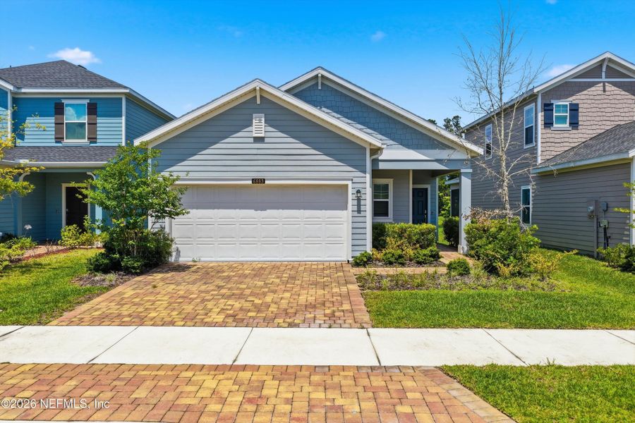 Front exterior of a new home in , Jacksonville, FL, highlighting curb appeal (Image 22).