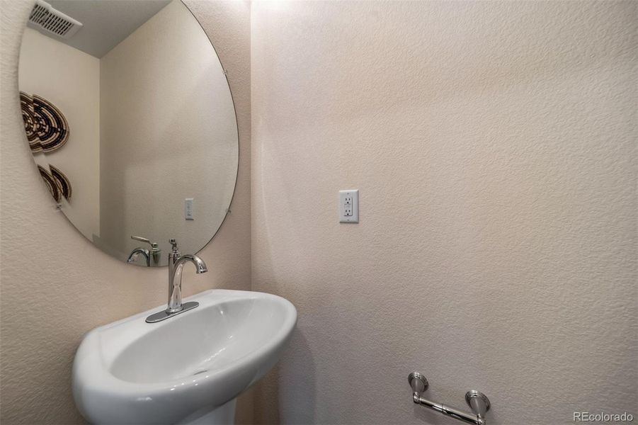 Close-up of interior finishes inside a home in Reunion, Commerce City (Image 19).