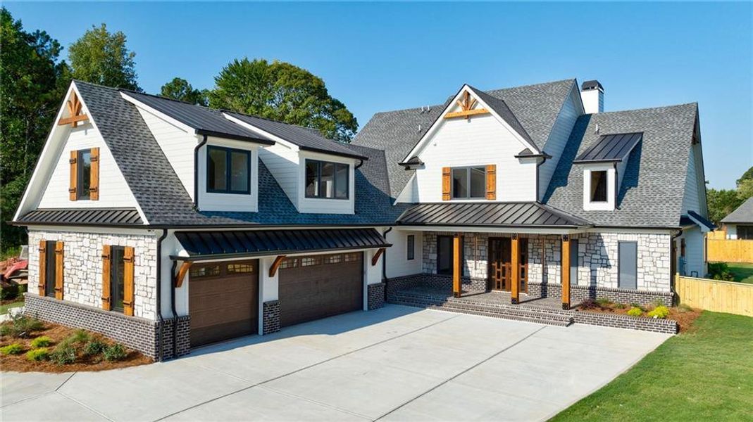 Front exterior of a new home in , Sugar Hill, GA, highlighting curb appeal (Image 32).