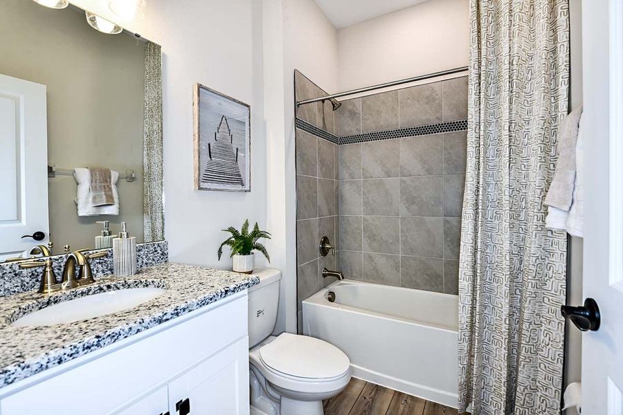 Furnished interior view inside a new home in The Sanctuary – Coastal Collection, Punta Gorda (Image 17).