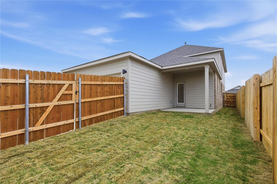 Exterior details and patio area of a home in Infinity Square, Kyle (Image 4).