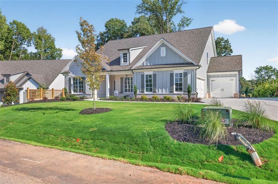 Front exterior of a new home in , Gainesville, GA, highlighting curb appeal (Image 25).