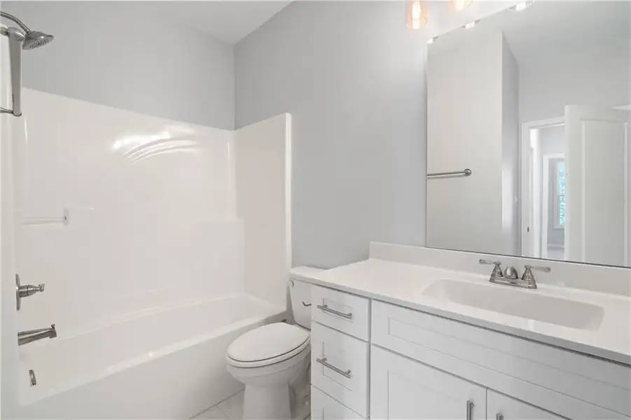 Furnished interior view inside a new home in , Gray (Image 9).