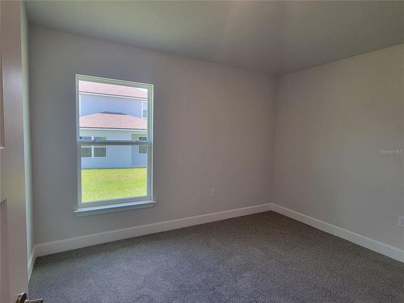 Spacious, unfurnished interior of a new home in Abbey Glen, Dade City (Image 19).