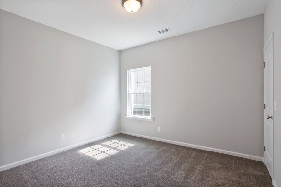 Representative unfurnished interior of a home built from the The Marne With Bonus by RTS Homes in Grand Reserve, Hinesville (Image 18).