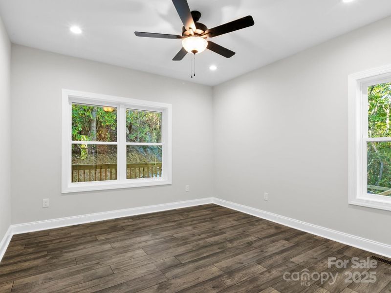 Spacious, unfurnished interior of a new home in , Black Mountain (Image 21).