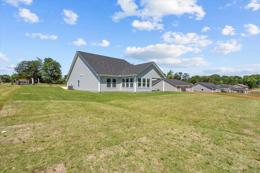 Representative exterior photo of a completed home built from the Fernwood by Enchanted Homes in Ballentine Ridge, Lyman, SC (Image 24).