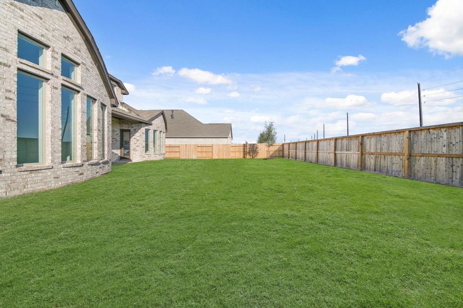 Exterior details and patio area of a home in Valencia 70', Manvel (Image 17). Exterior details and patio area of a home in Valencia 70', Manvel (Image 17).