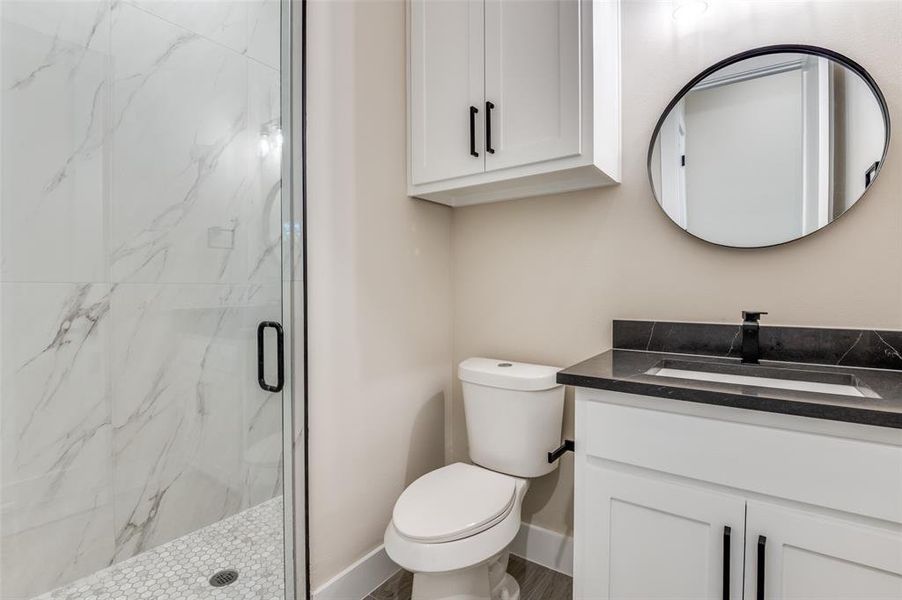 3rd Full bath with marble finish show and linen storage 3rd Full bath with marble finish show and linen storage