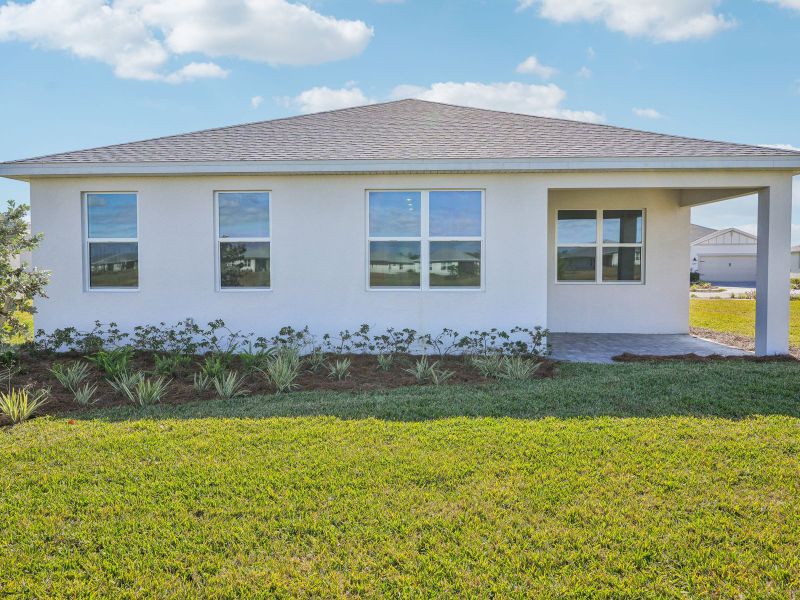 Exterior details and patio area of a home in Crescent Lakes - Reserve Series, Punta Gorda (Image 18).