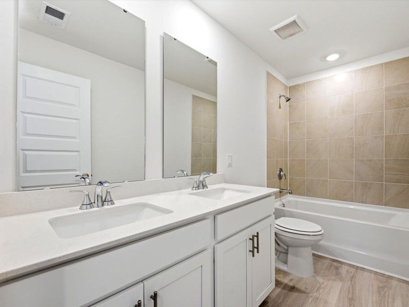 Furnished interior view inside a new home in The Coves at Lakes of Cane Bay II, Summerville (Image 9).