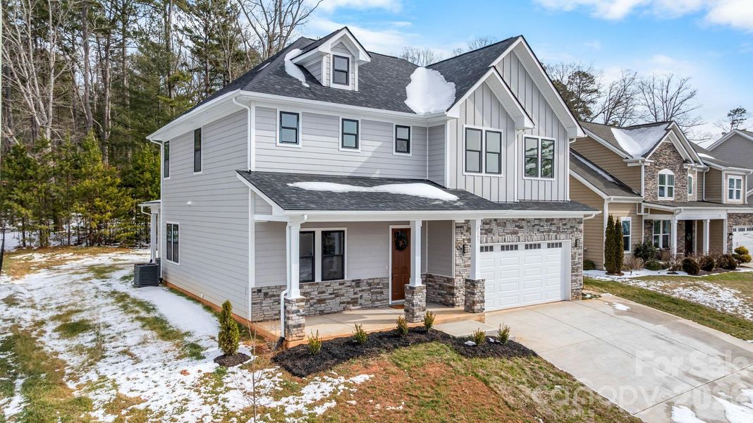 Front exterior of a new home in , Hickory, NC, highlighting curb appeal (Image 30).