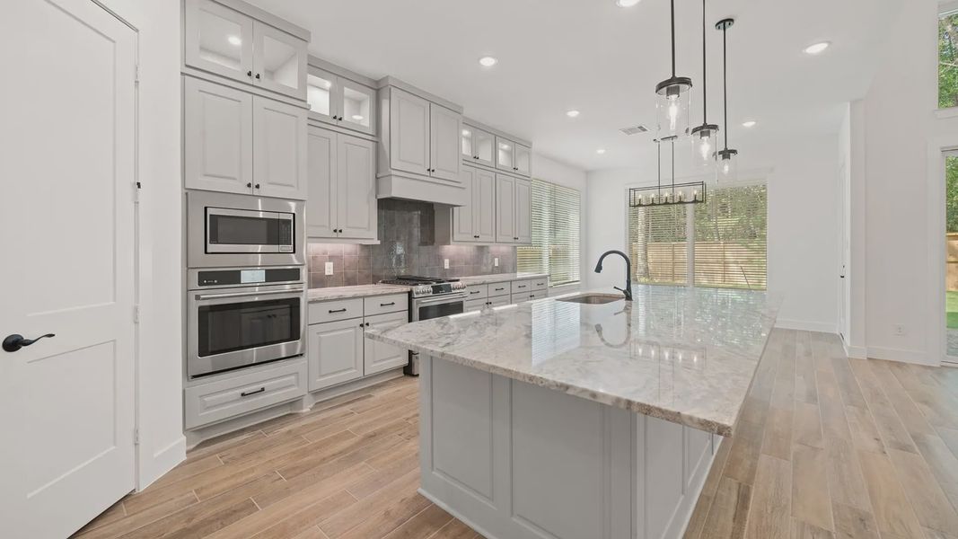 Representative furnished interior of a home built from the Waterloo by Chesmar Homes in Attwater 65's, Waller (Image 5).