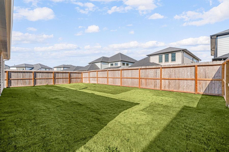 Exterior details and patio area of a home in Harvest Green, Richmond (Image 30). Exterior details and patio area of a home in Harvest Green, Richmond (Image 30).