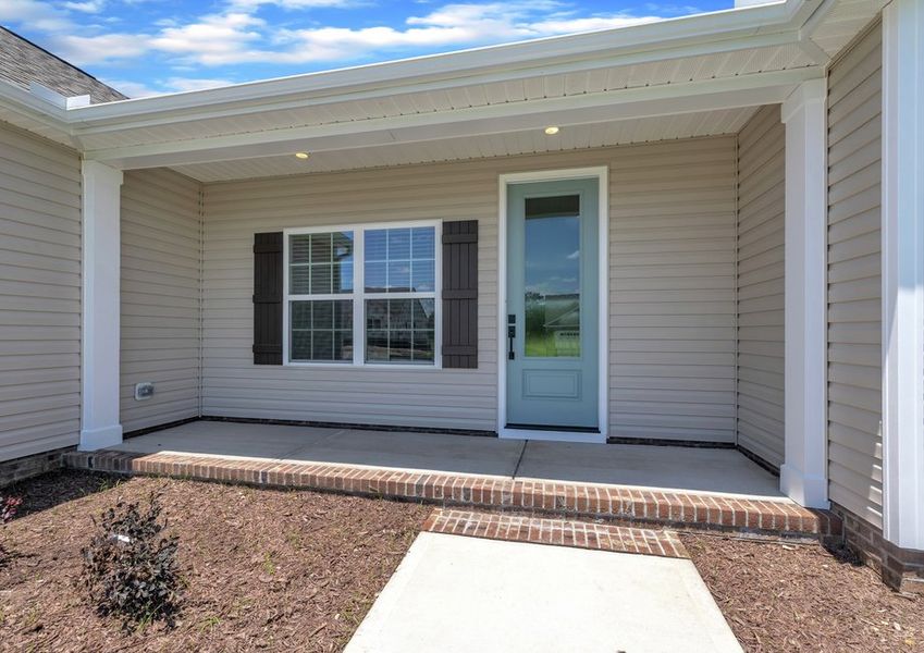 Front porch of the Taylor has enough space for furniture. Front porch of the Taylor has enough space for furniture.