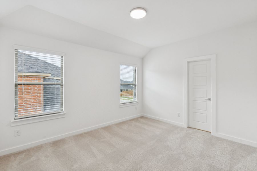 Bedroom in the Da Vinci II home plan by Trophy Signature Homes – REPRESENTATIVE PHOTO