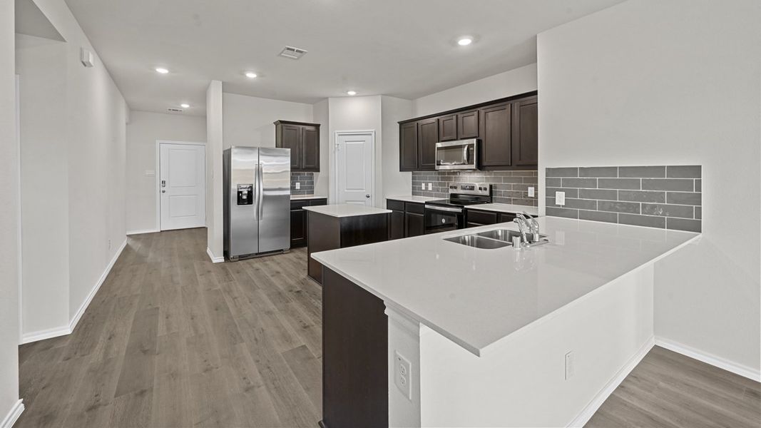 Furnished interior view inside a new home in Valor Farms, Royse City (Image 12).