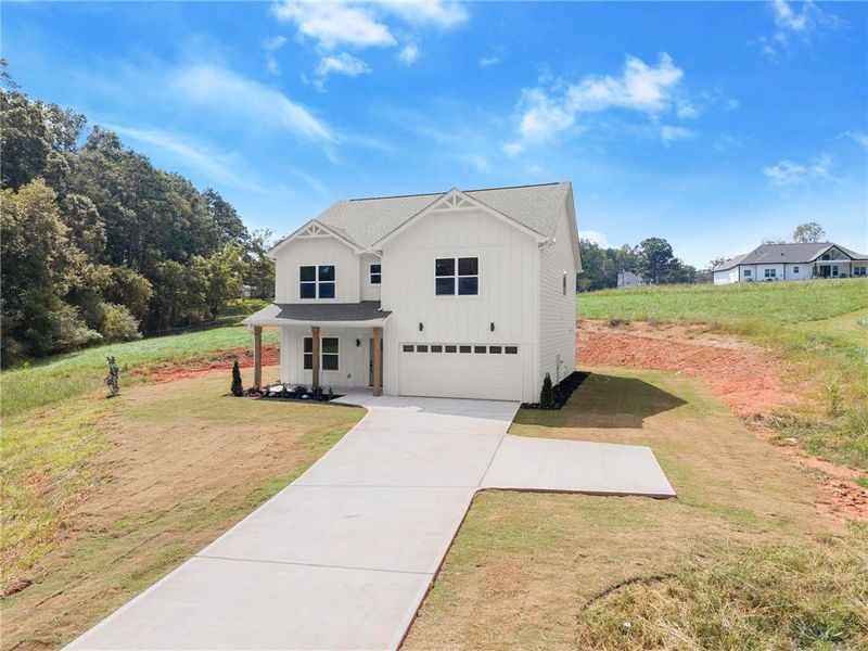 Front exterior of a new home in , Clarkesville, GA, highlighting curb appeal (Image 19).