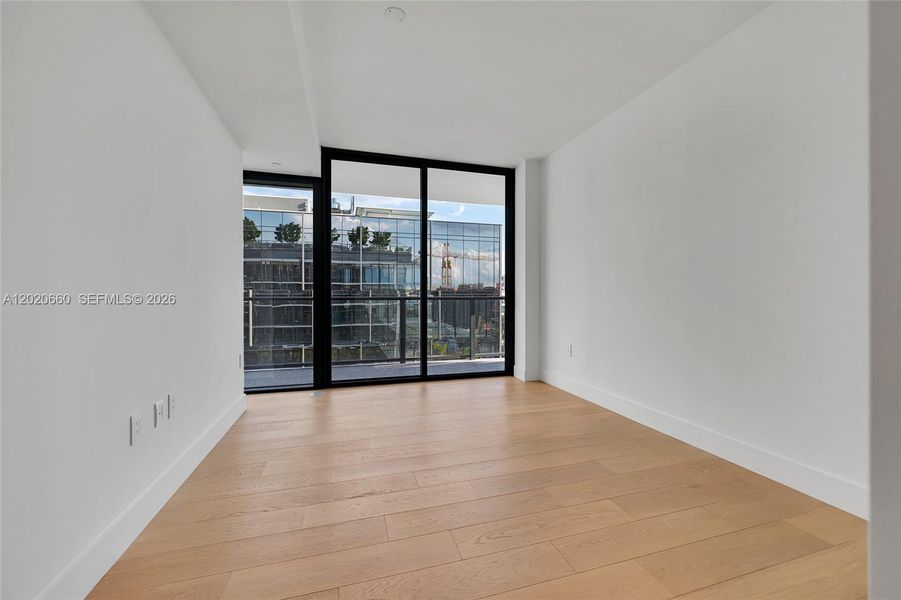 Spacious, unfurnished interior of a new home in , Bay Harbor Islands (Image 24).