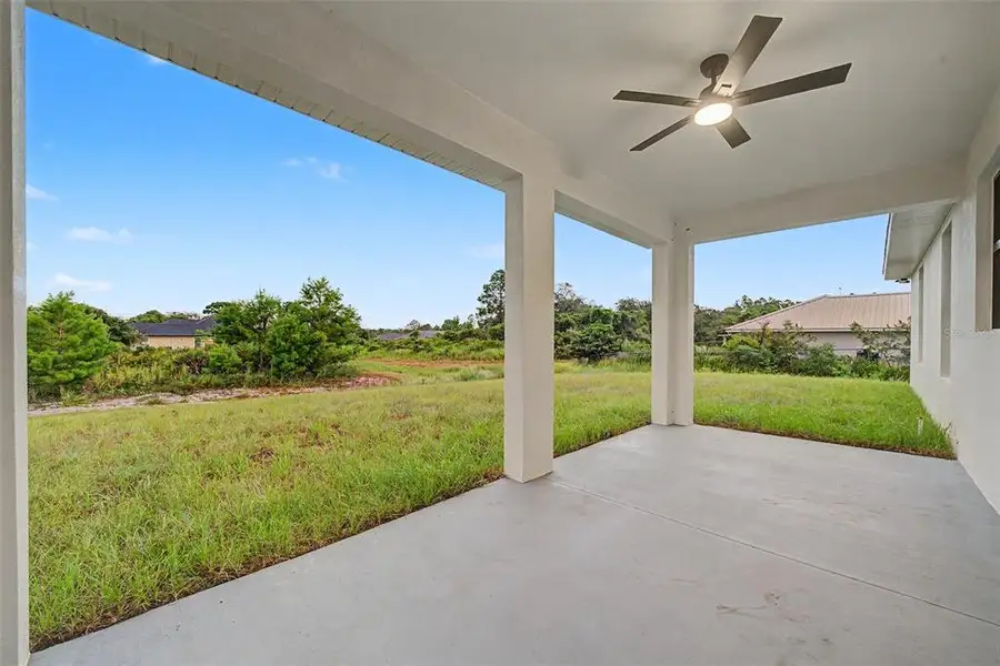 Exterior details and patio area of a home in , Sebring (Image 3). Exterior details and patio area of a home in , Sebring (Image 3).