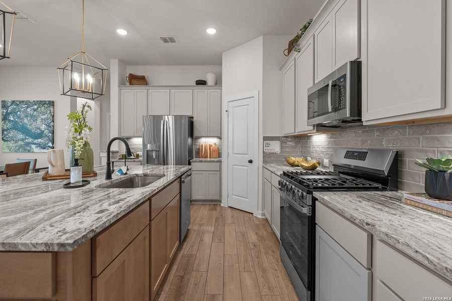 Furnished interior view inside a new home in The Crossvine, Schertz (Image 20).