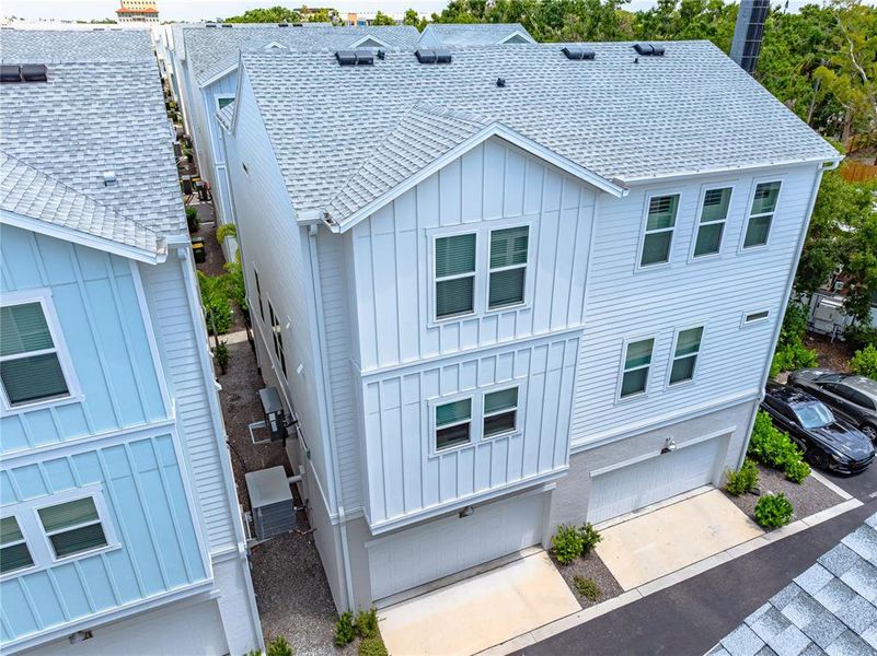 Front exterior of a new home in , Sarasota, FL, highlighting curb appeal (Image 22).