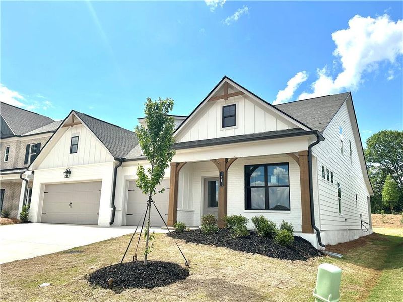 Front exterior of a new home in Summerlin, Winder, GA, highlighting curb appeal (Image 42).
