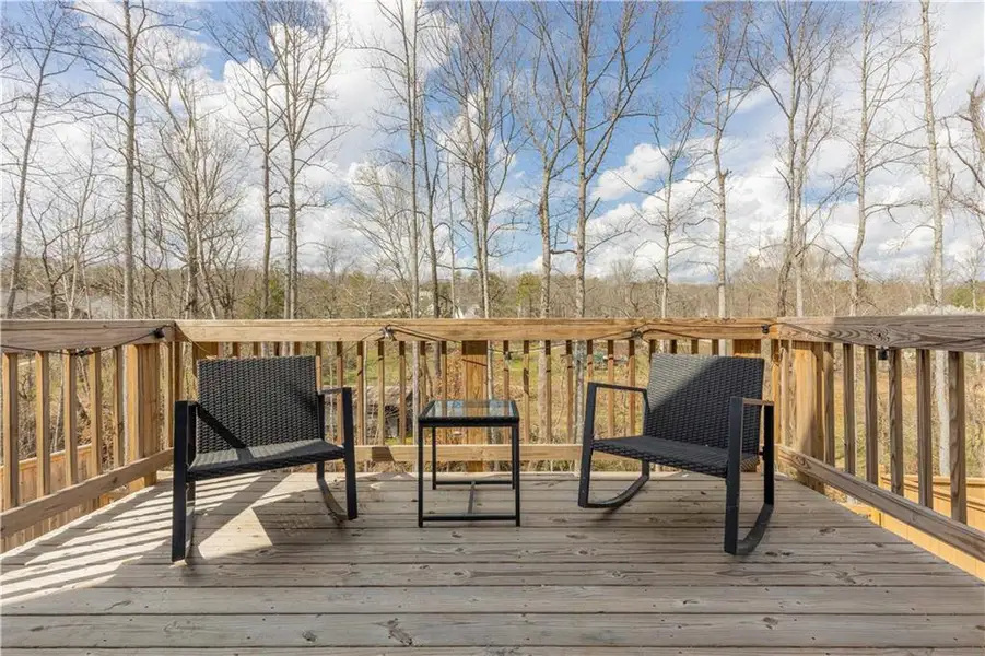 Exterior details and patio area of a home in Creekside at Farmers Crossing, Ball Ground (Image 4).