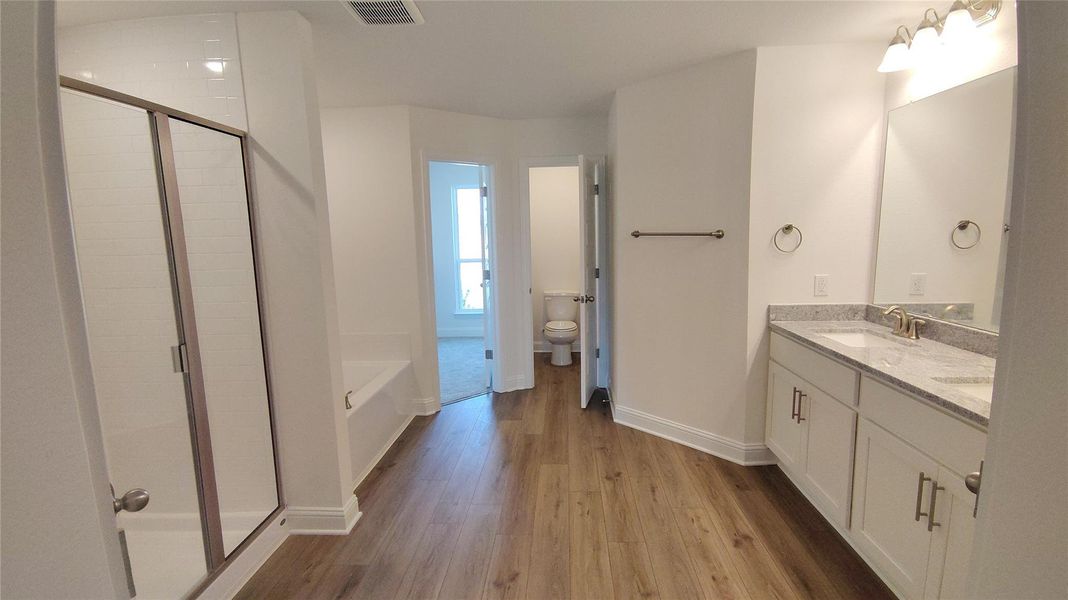 Primary bath that comes with 2 clothing closets