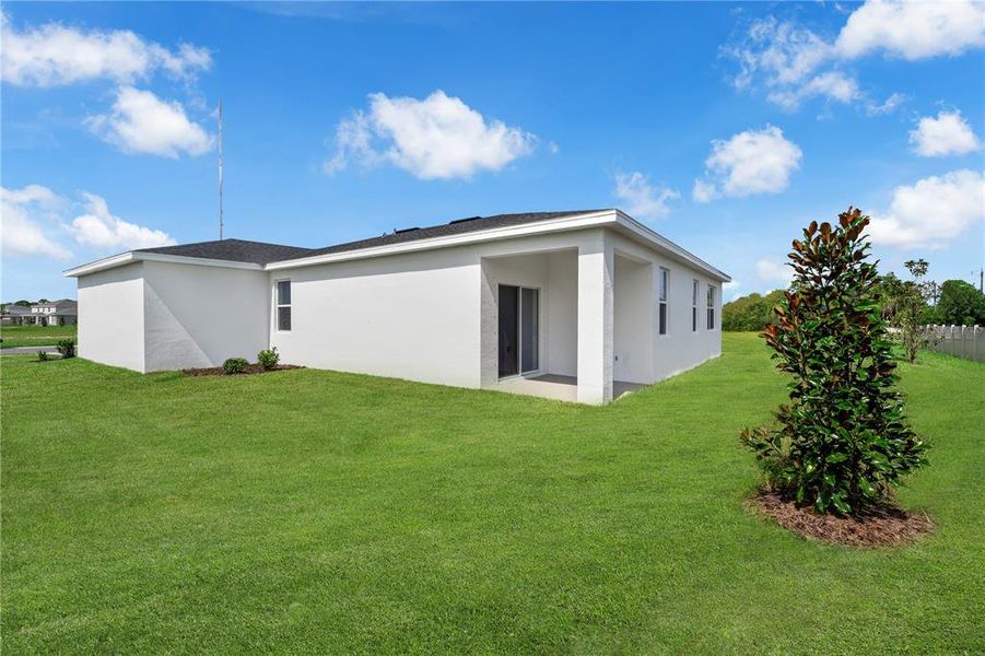 Exterior details and patio area of a home in Green Leaf, West Melbourne (Image 21).